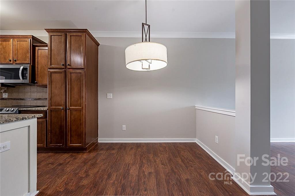 527 Alderman Lane Fort Mill, SC 29715 - Photo 6 of 17 wooden floor in an empty room with a window