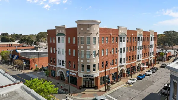 a front view of a building with street view