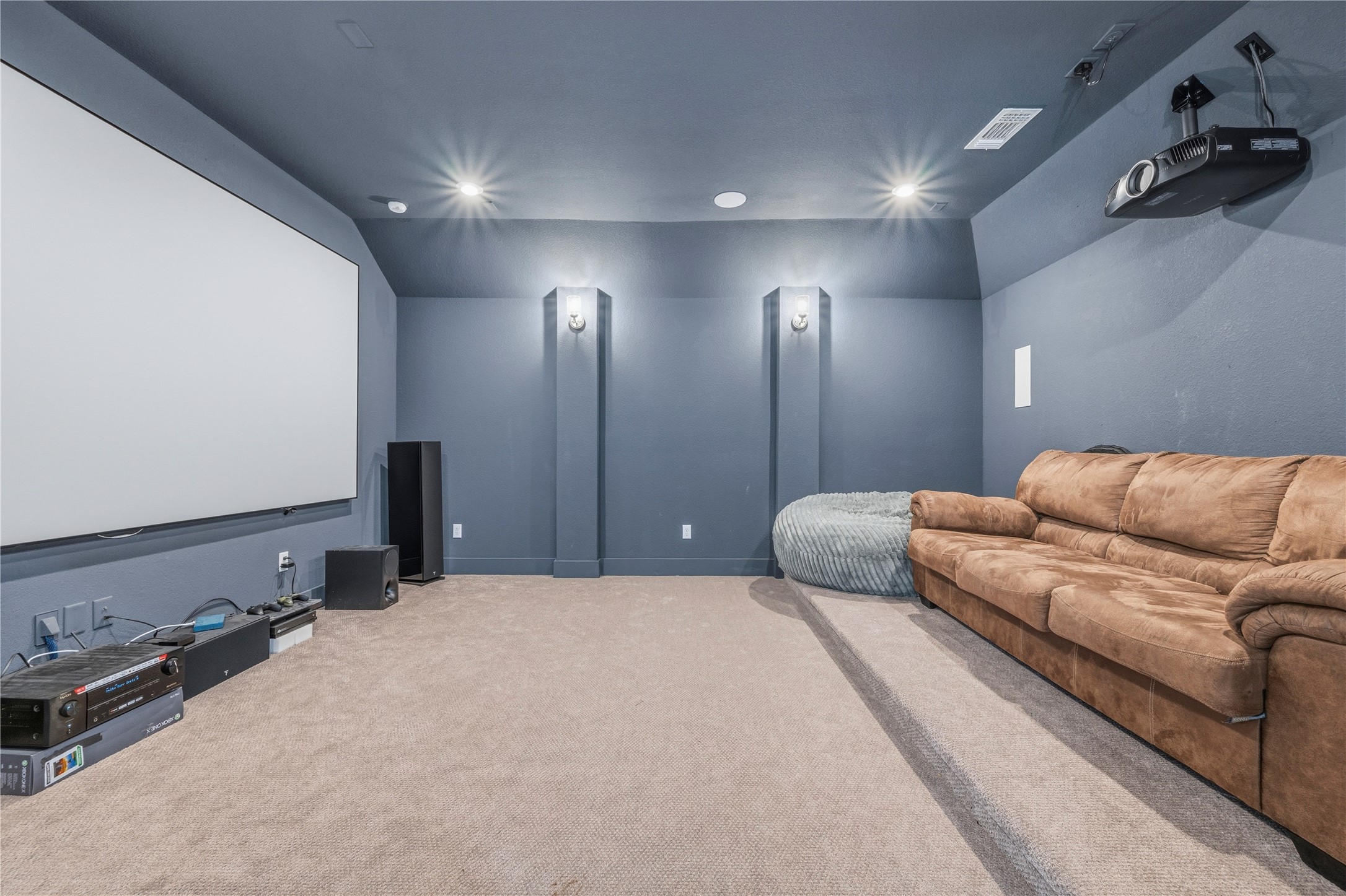 105 Autumn Oak Way Georgetown, TX 78628 - Photo 32 of 40 Dedicated media room featuring a large projection screen and wall-mounted projector
