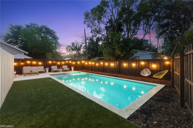 a view of a golf club with a swimming pool