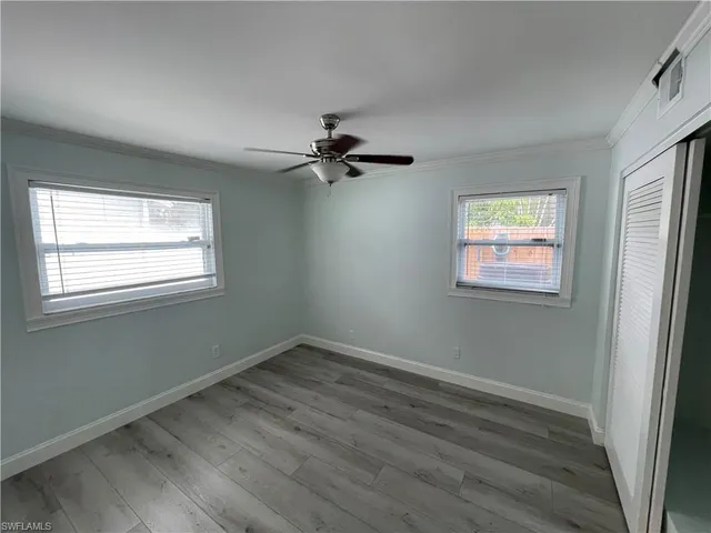 a view of a room that has a window in it