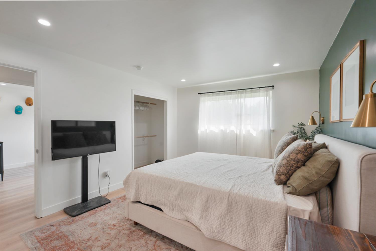 3280 Cheyenne Drive Merced, CA 95348 - Photo 13 of 17 a bedroom with a bed and a flat screen tv