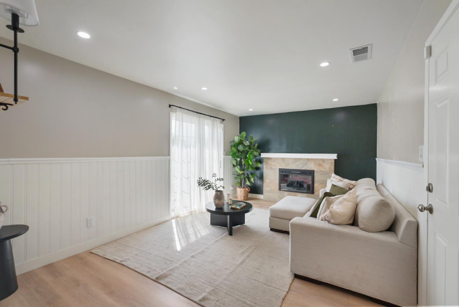 3280 Cheyenne Drive Merced, CA 95348 - Photo 4 of 17 a living room with furniture and a fireplace
