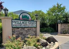 a view of a street sign under an umbrella