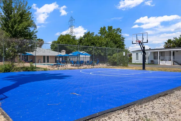 a view of a house with swimming pool