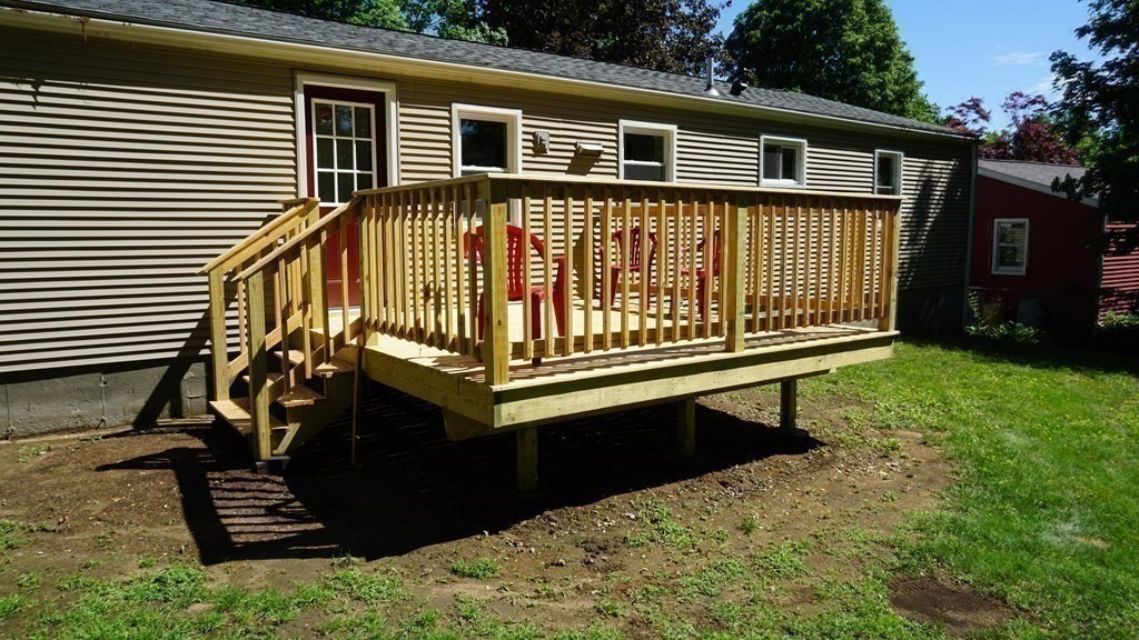 95 Sierra Vista Road Springfield, MA 01128 - Photo 25 of 28 a view of a house with a wooden deck