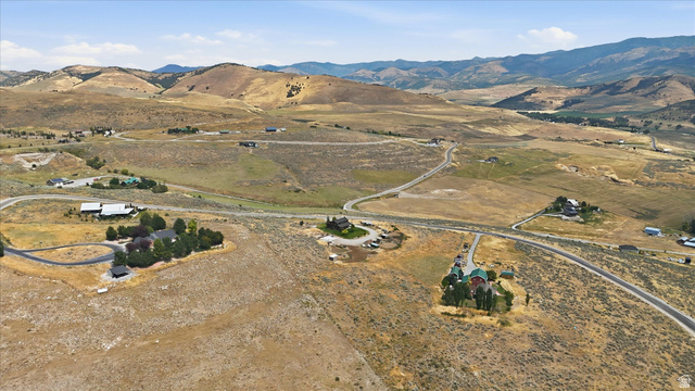 715 Ranch Loop Road Preston, ID 83263 - Photo 67 of 77 Expansive rural landscape featuring winding roads and distant mountainous terrain
