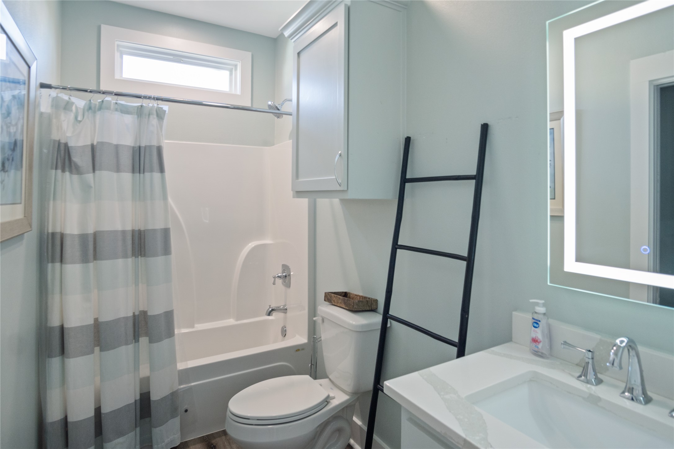 940 Raymond Port Bolivar, TX 77650 - Photo 31 of 46 a bathroom with a sink toilet and shower