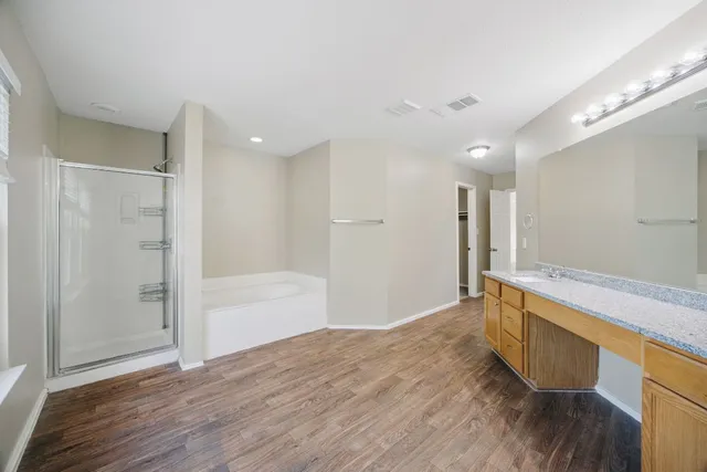 a bathroom with a sink and a bathtub
