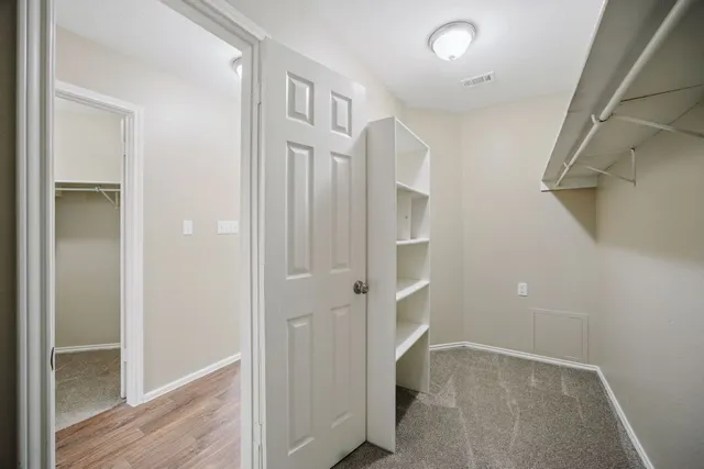 a view of entryway with wooden floor