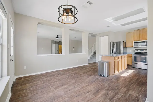 a view of kitchen and windows