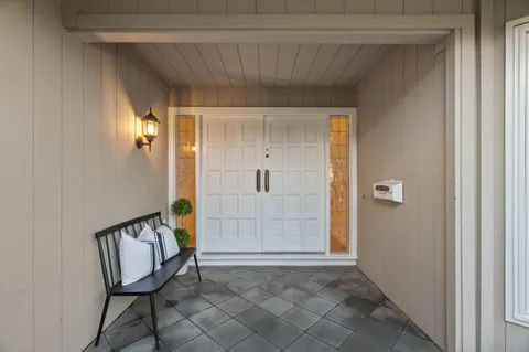 a view of an entryway with sitting area