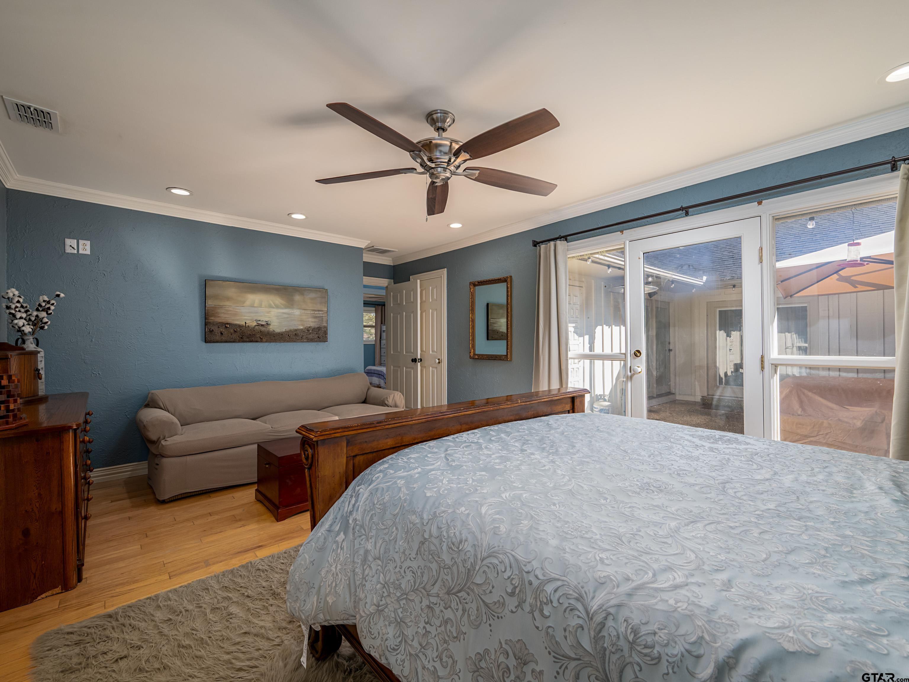 8212 Cambridge Road Tyler, TX 75703 - Photo 16 of 44 a living room with furniture and a large window