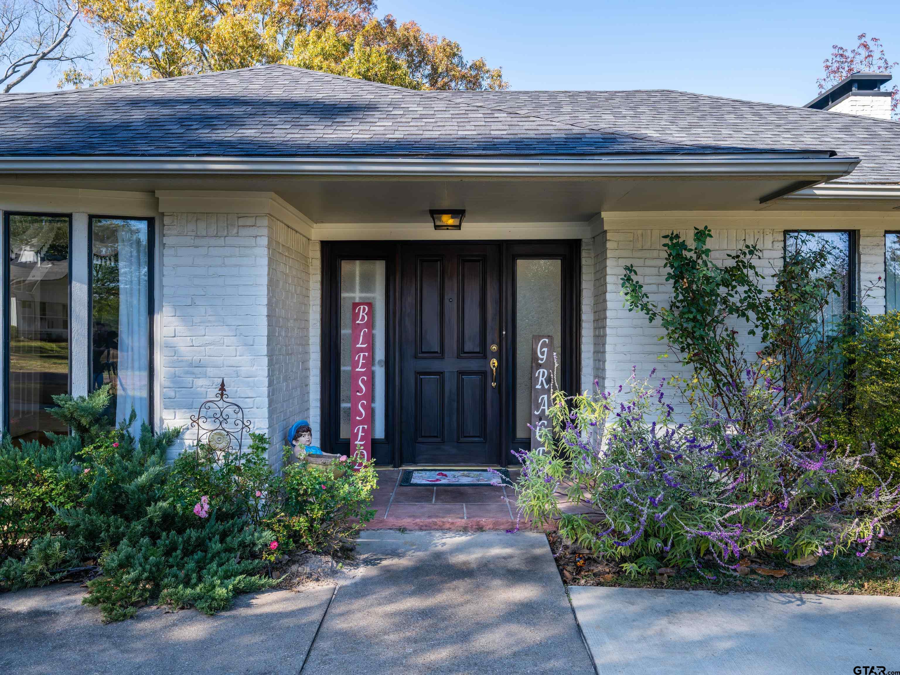 8212 Cambridge Road Tyler, TX 75703 - Photo 6 of 44 a front view of a house