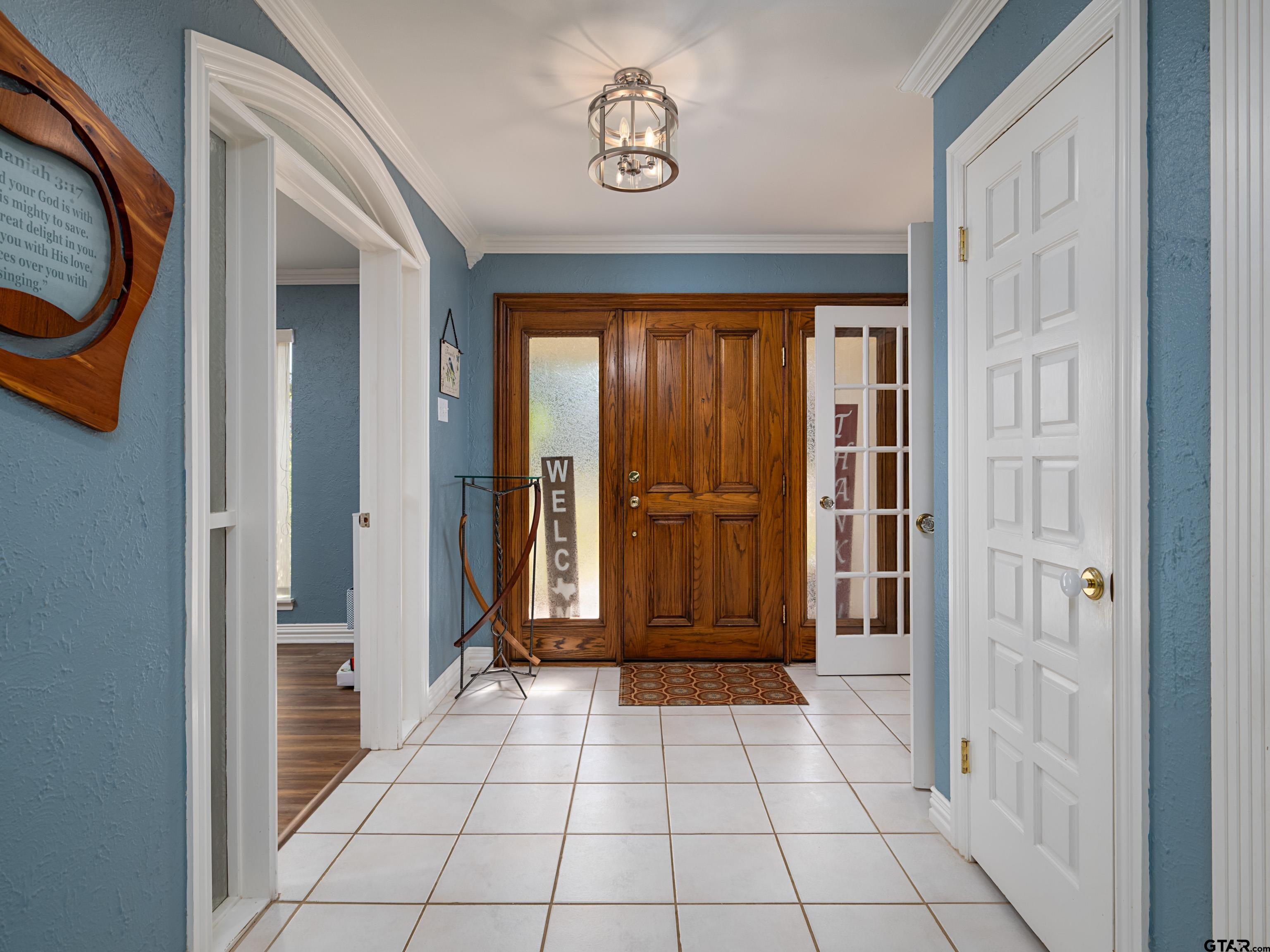 8212 Cambridge Road Tyler, TX 75703 - Photo 7 of 44 a view of an entryway with a door