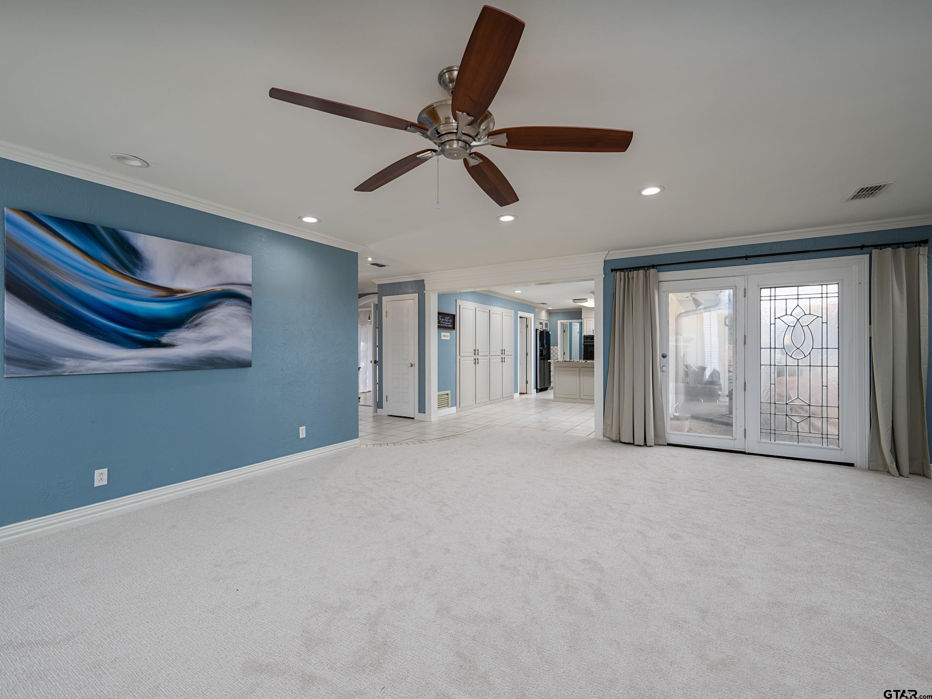 8212 Cambridge Road Tyler, TX 75703 - Photo 9 of 44 a view of an empty room with a window