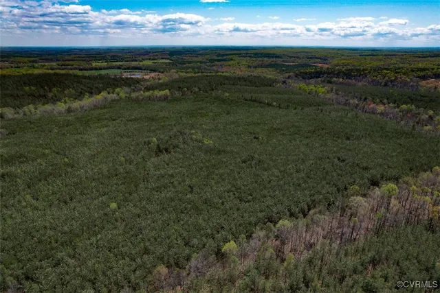 a view of an ocean and a yard