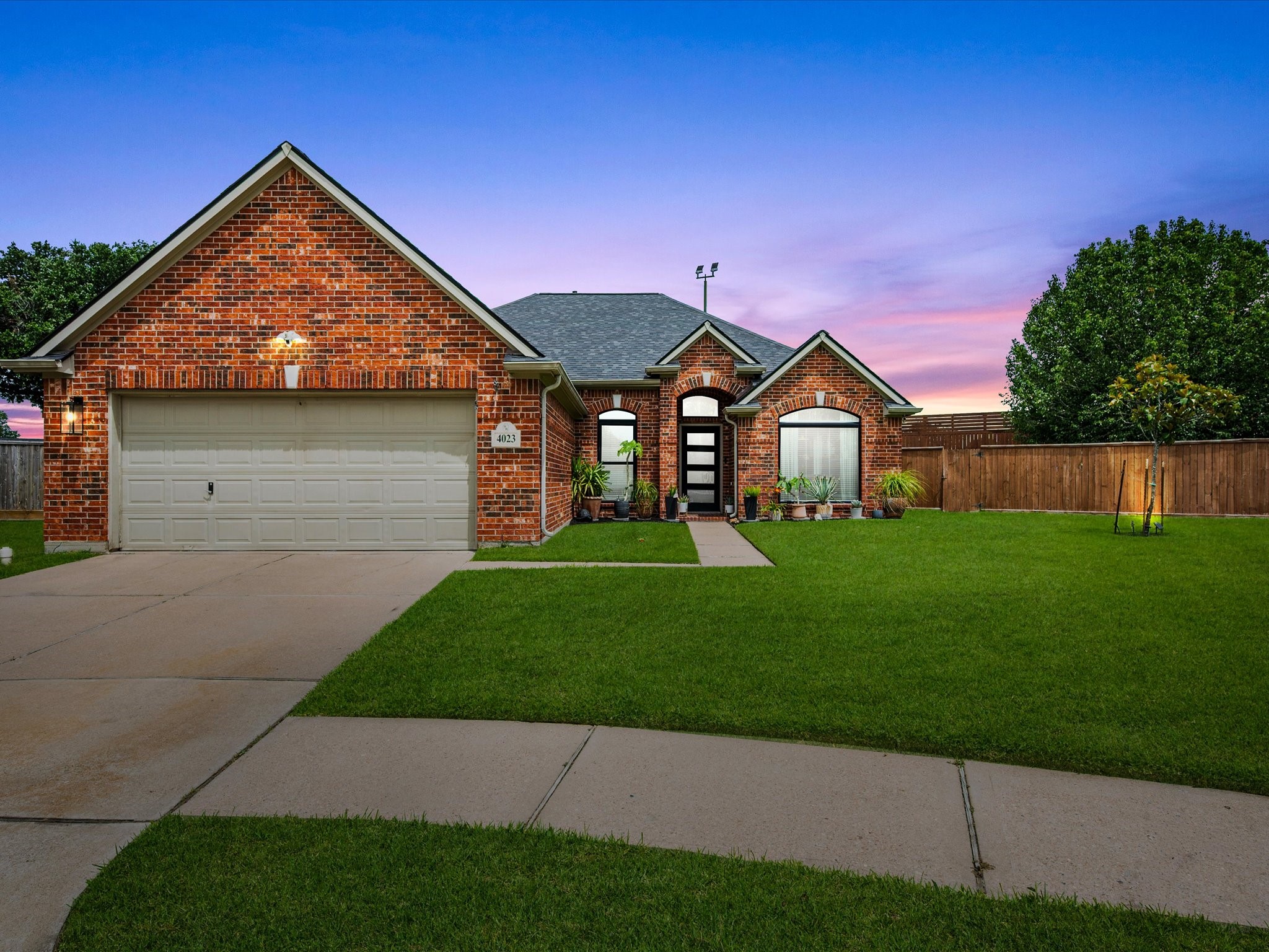 A striking first impression, this completely renovated residence sits gracefully on a spacious cul-de-sac lot, immediately showcasing its thoughtful updates, high-end finishes, and inviting curb appeal.
