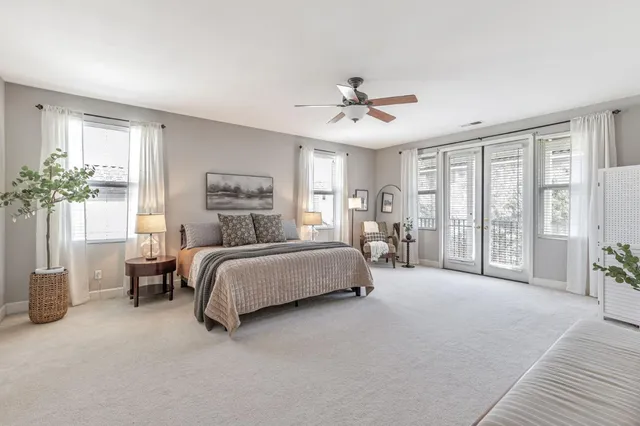 a view of a balcony with wooden floor