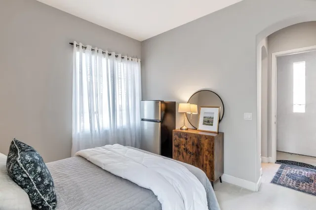 a bath room with a toilet and a bath tub
