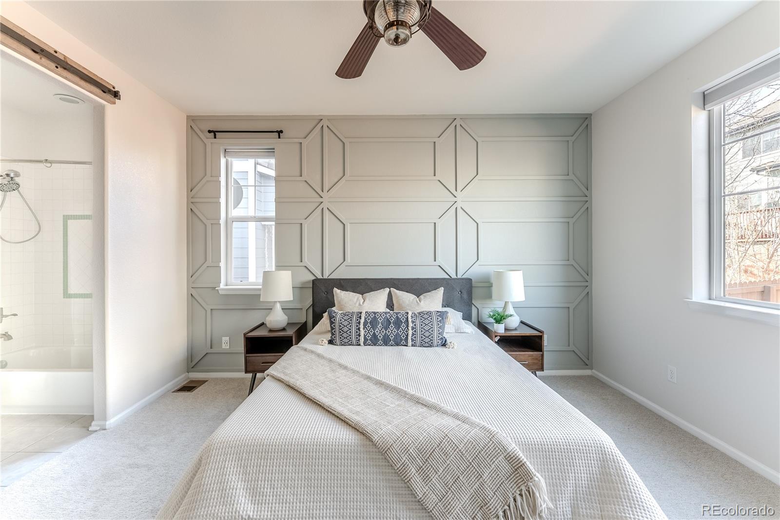 602 Mathews Way Erie, CO 80516 - Photo 18 of 50 a bedroom with a bed and a window