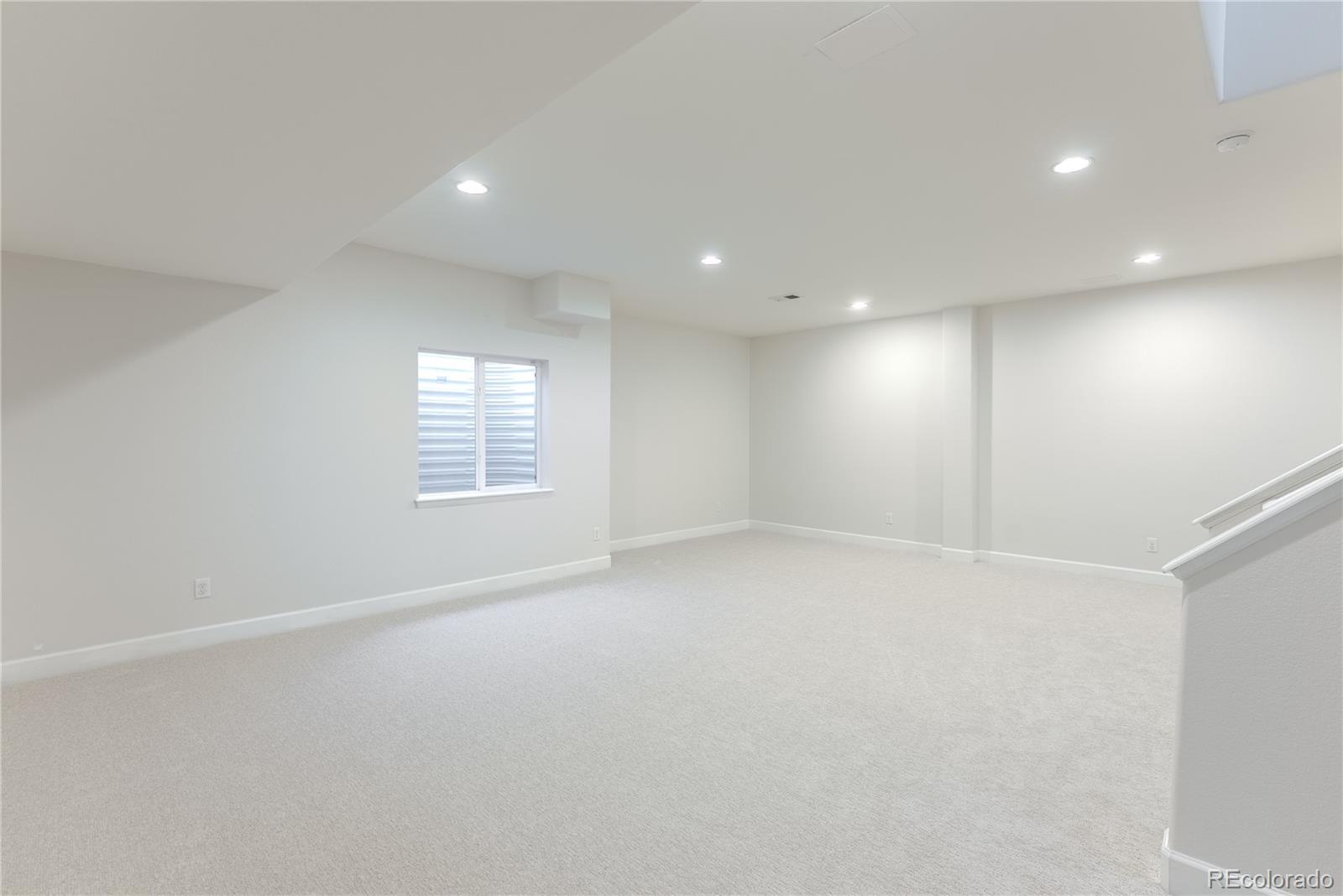 602 Mathews Way Erie, CO 80516 - Photo 30 of 50 an empty room with windows