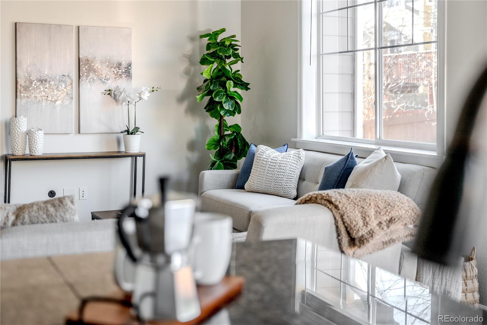 602 Mathews Way Erie, CO 80516 - Photo 6 of 50 a bed sitting in a bedroom next to a window