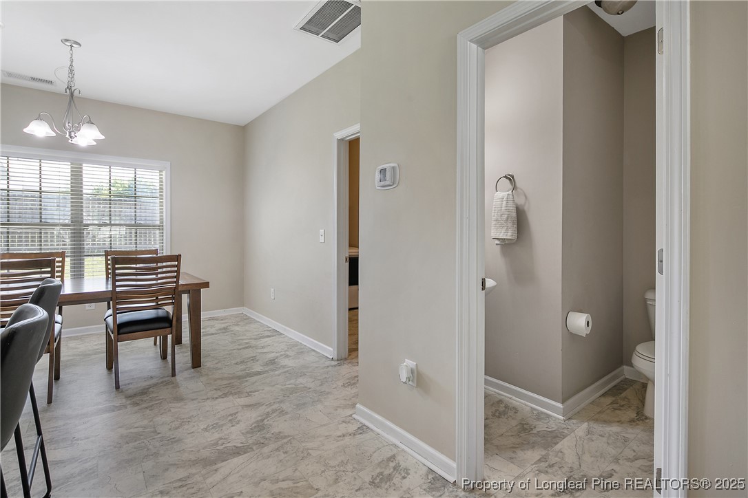 21 Bicentennial Way Cameron, NC 28326 - Photo 13 of 50 a view of a room with entryway wooden floor and windows