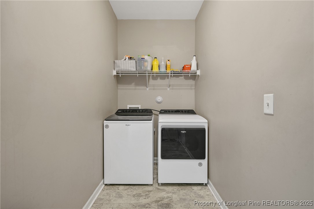 21 Bicentennial Way Cameron, NC 28326 - Photo 28 of 50 a utility room with dryer and washer