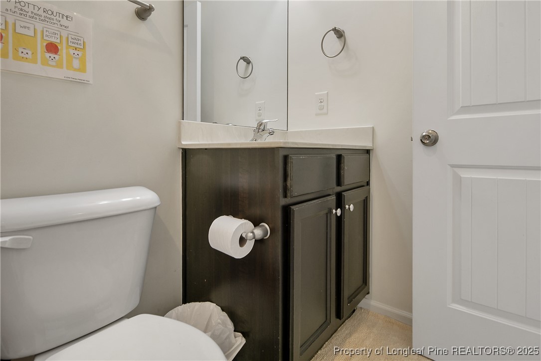 21 Bicentennial Way Cameron, NC 28326 - Photo 39 of 50 a bathroom with a toilet and a shower