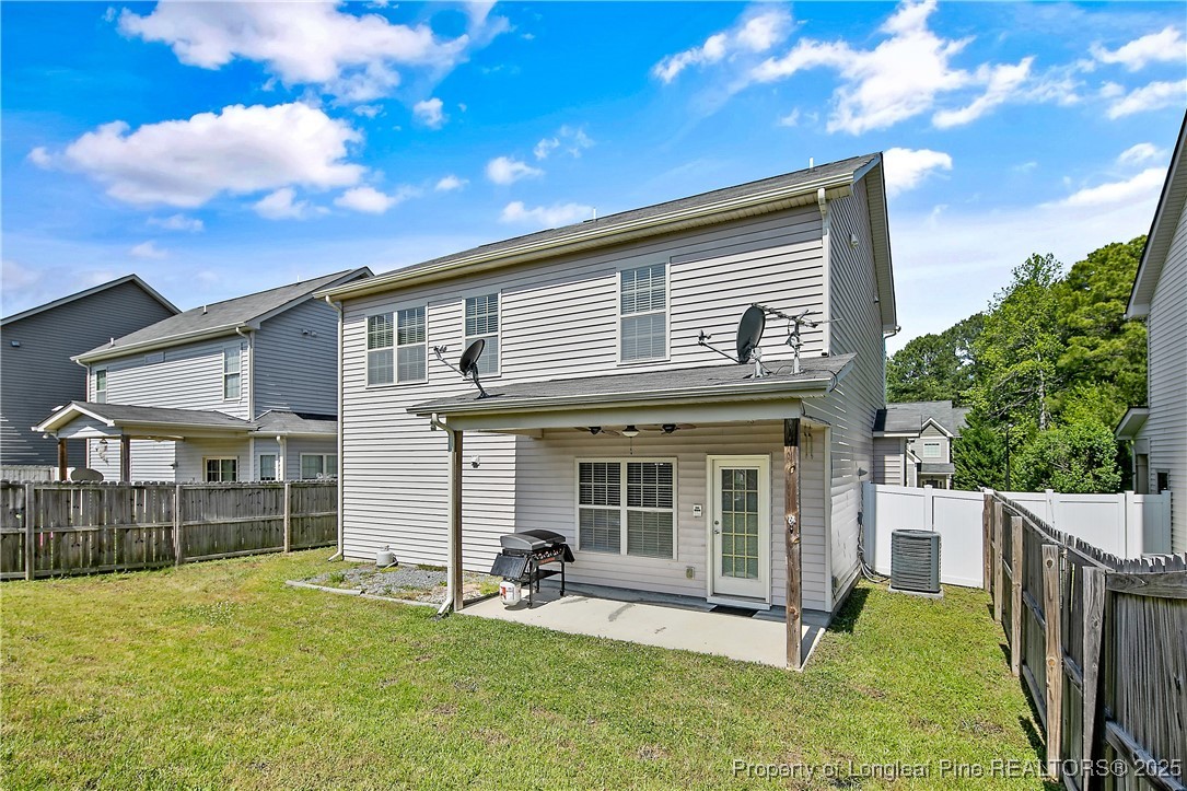 21 Bicentennial Way Cameron, NC 28326 - Photo 48 of 50 a view of a house with backyard porch and sitting area