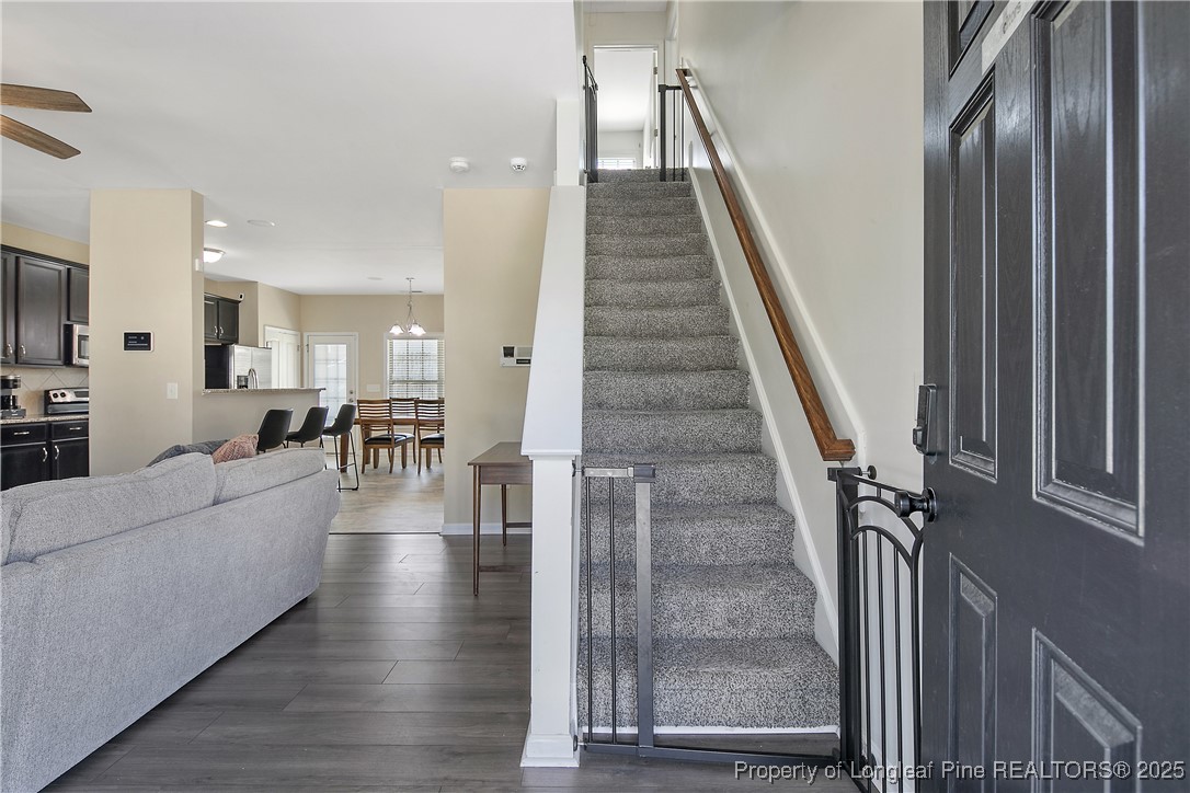 21 Bicentennial Way Cameron, NC 28326 - Photo 5 of 50 a living room with furniture and a table