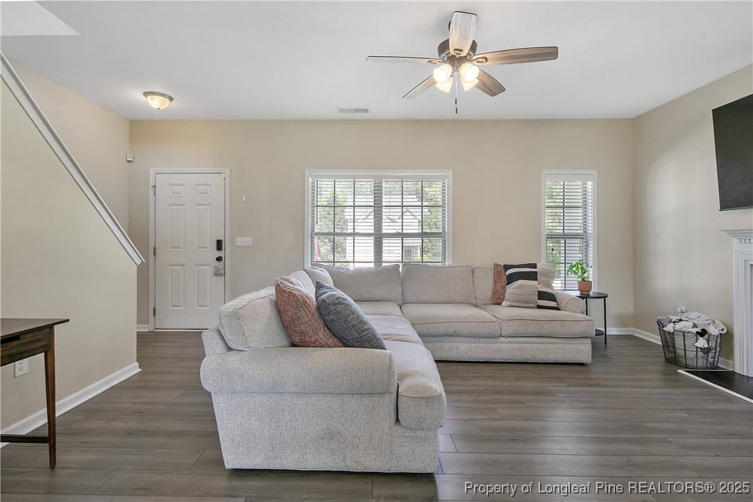 21 Bicentennial Way Cameron, NC 28326 - Photo 9 of 50 a living room with furniture and a window