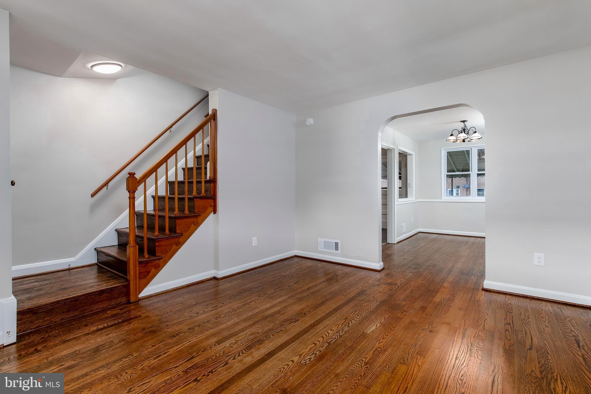 7720 Wynbrook Road Baltimore, MD 21224 - Photo 4 of 25 Refinished hardwood floors