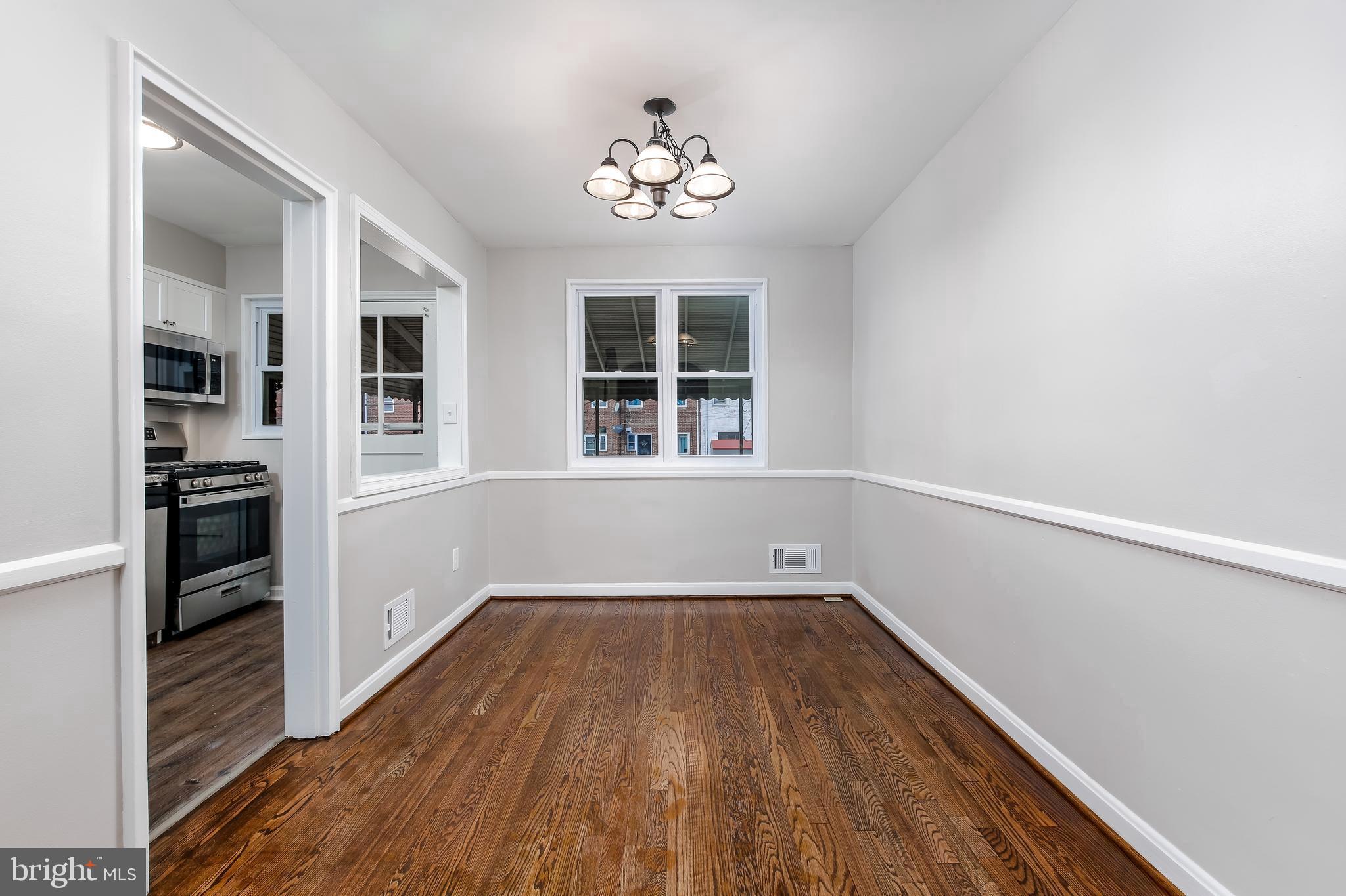 7720 Wynbrook Road Baltimore, MD 21224 - Photo 10 of 25 Dining room opens to kitchen
