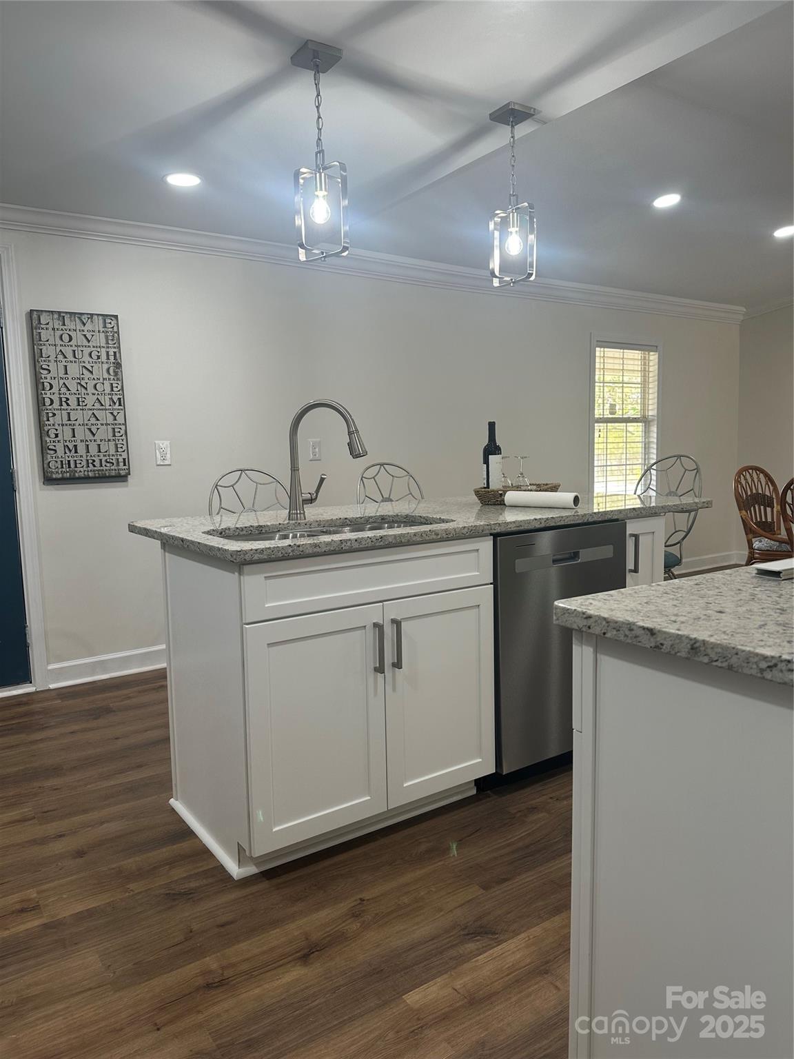 8225 Linwood-Southmont Road Lexington, NC 27292 - Photo 11 of 30 a kitchen with a sink cabinets and wooden floor