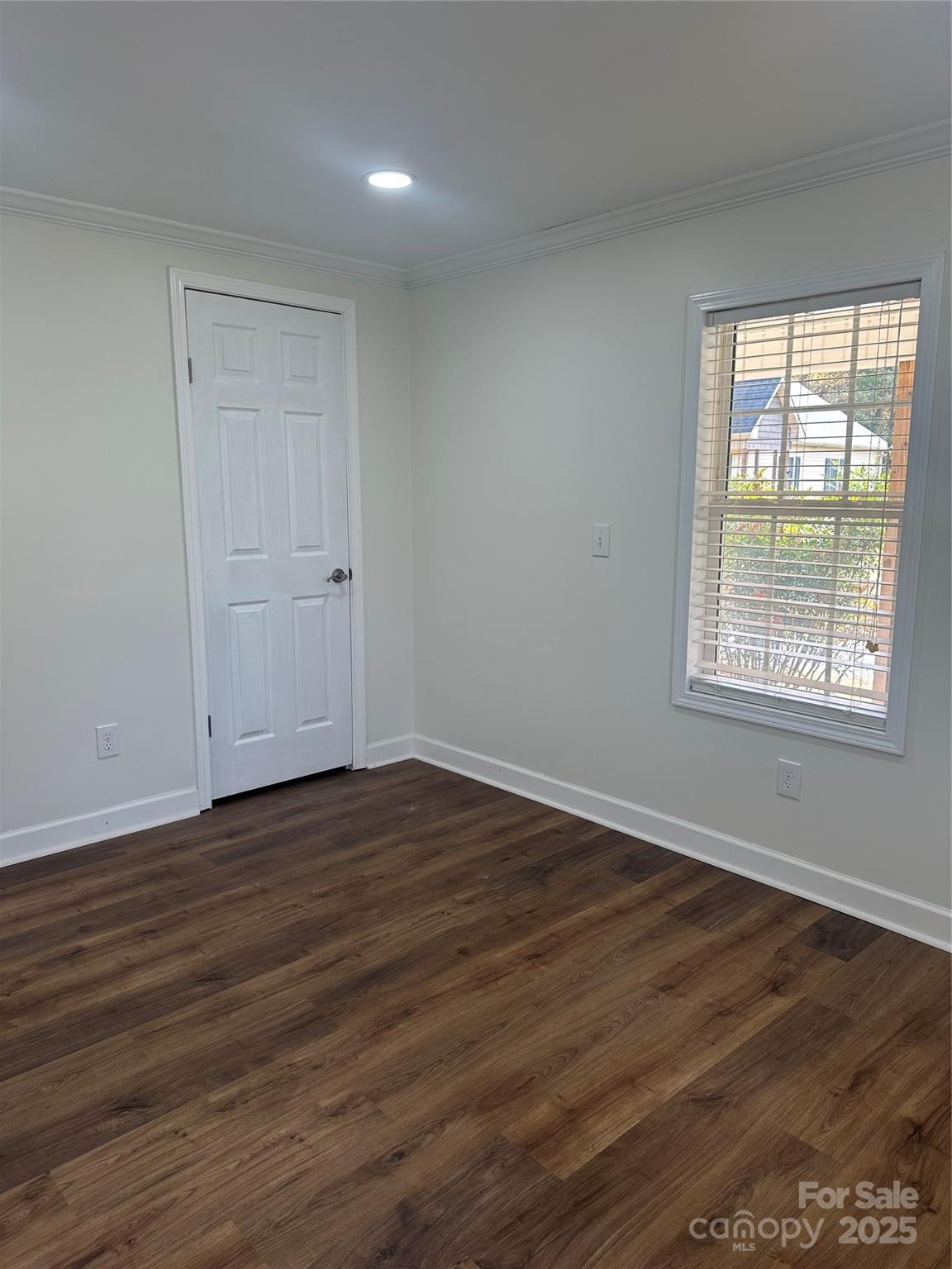 8225 Linwood-Southmont Road Lexington, NC 27292 - Photo 14 of 30 a view of an empty room with wooden floor and a window