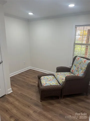 a bedroom with bed and window