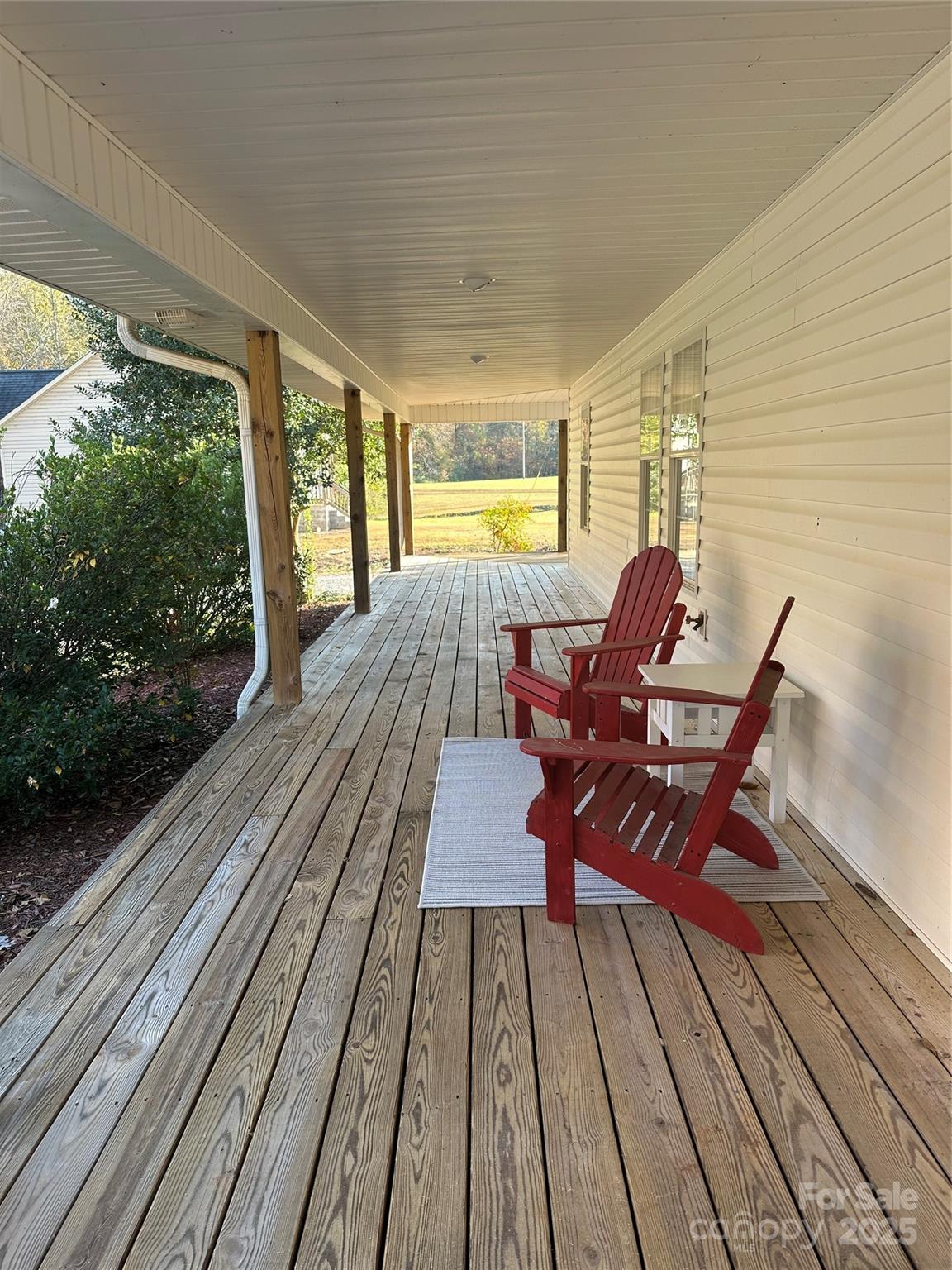 8225 Linwood-Southmont Road Lexington, NC 27292 - Photo 17 of 30 a view of a roof deck with wooden floor and city view