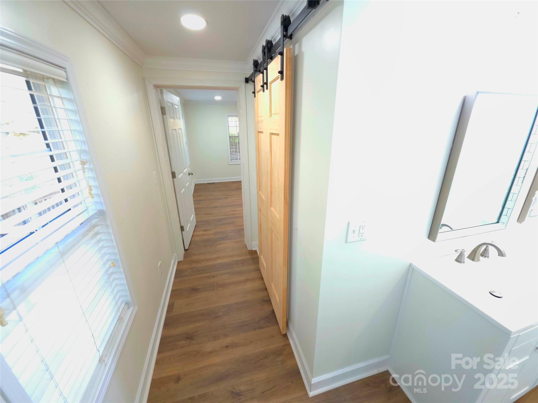 8225 Linwood-Southmont Road Lexington, NC 27292 - Photo 18 of 30 a view of a bathroom from a hallway