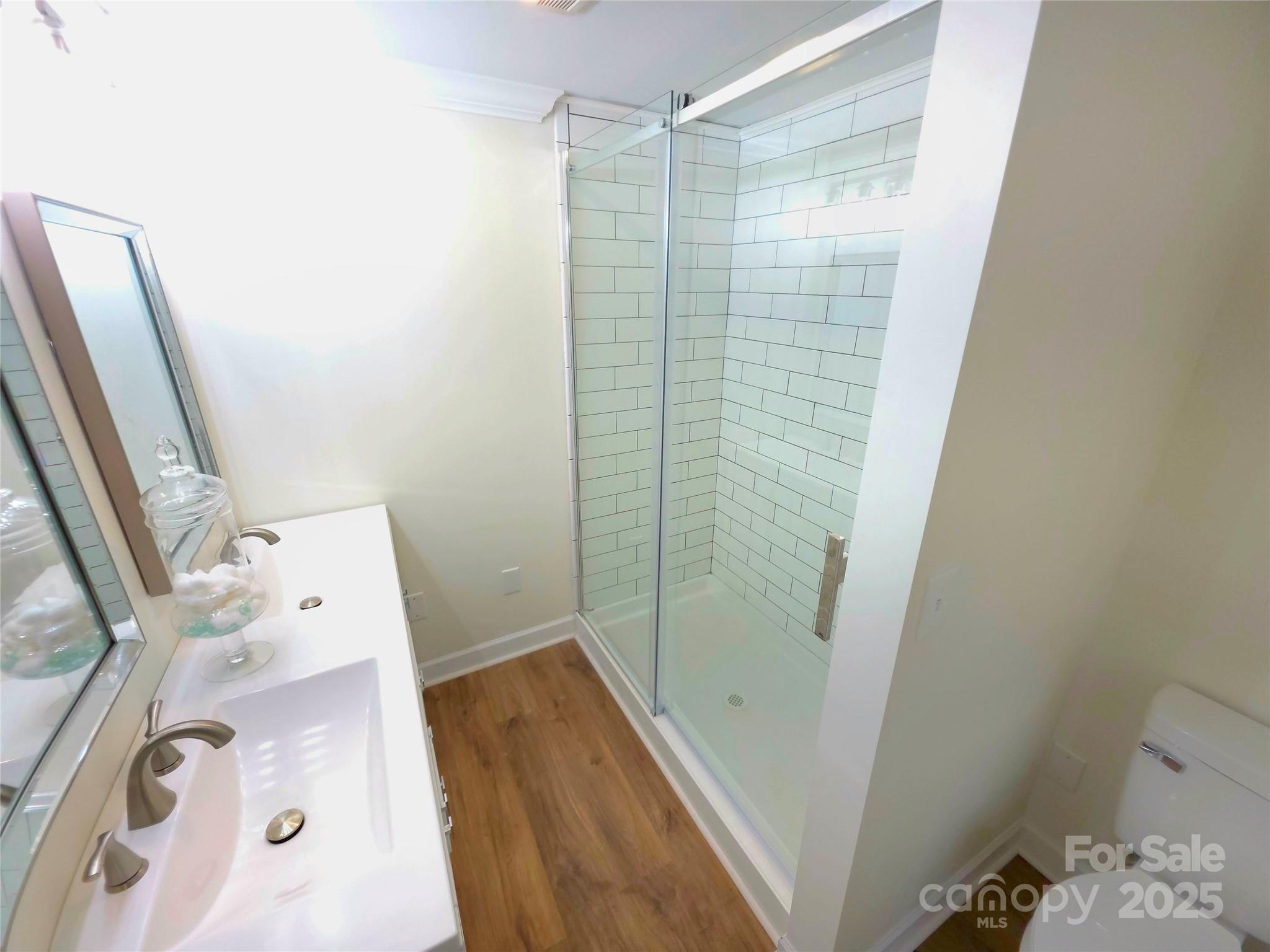 8225 Linwood-Southmont Road Lexington, NC 27292 - Photo 19 of 30 a bathroom with a shower and a sink