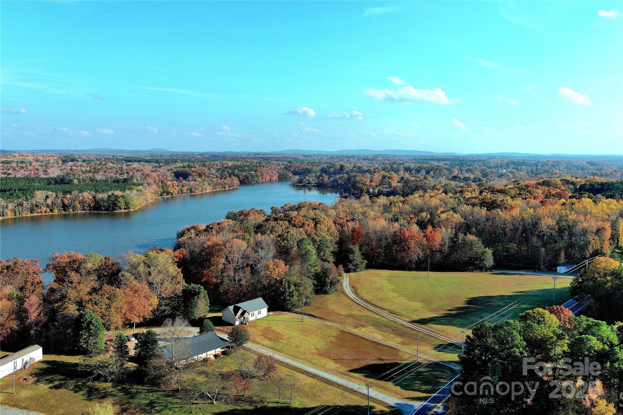 8225 Linwood-Southmont Road Lexington, NC 27292 - Photo 25 of 30 an aerial view of a house with a lake view