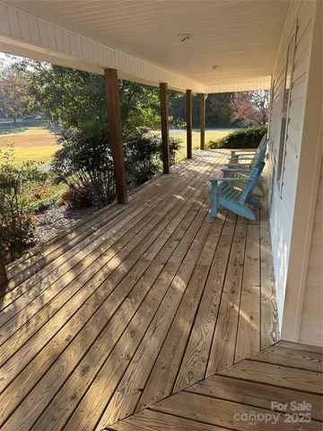 a view of swimming pool from balcony