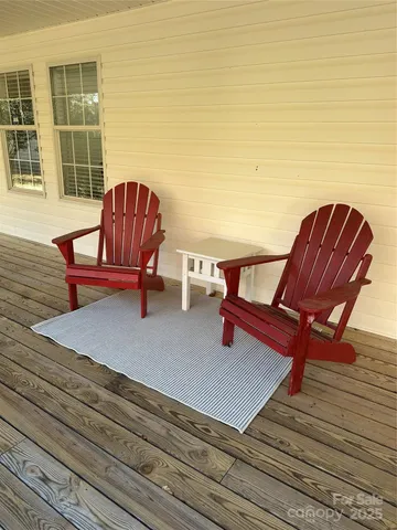 a view of a terrace with seating area