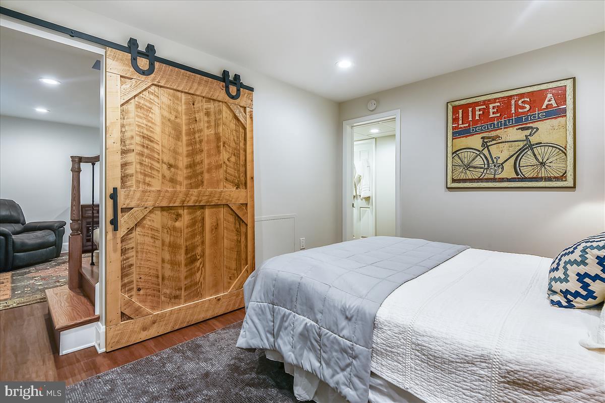 221 Gibson Road Annapolis, MD 21401 - Photo 36 of 58 Custom barn door in bonus/bedroom