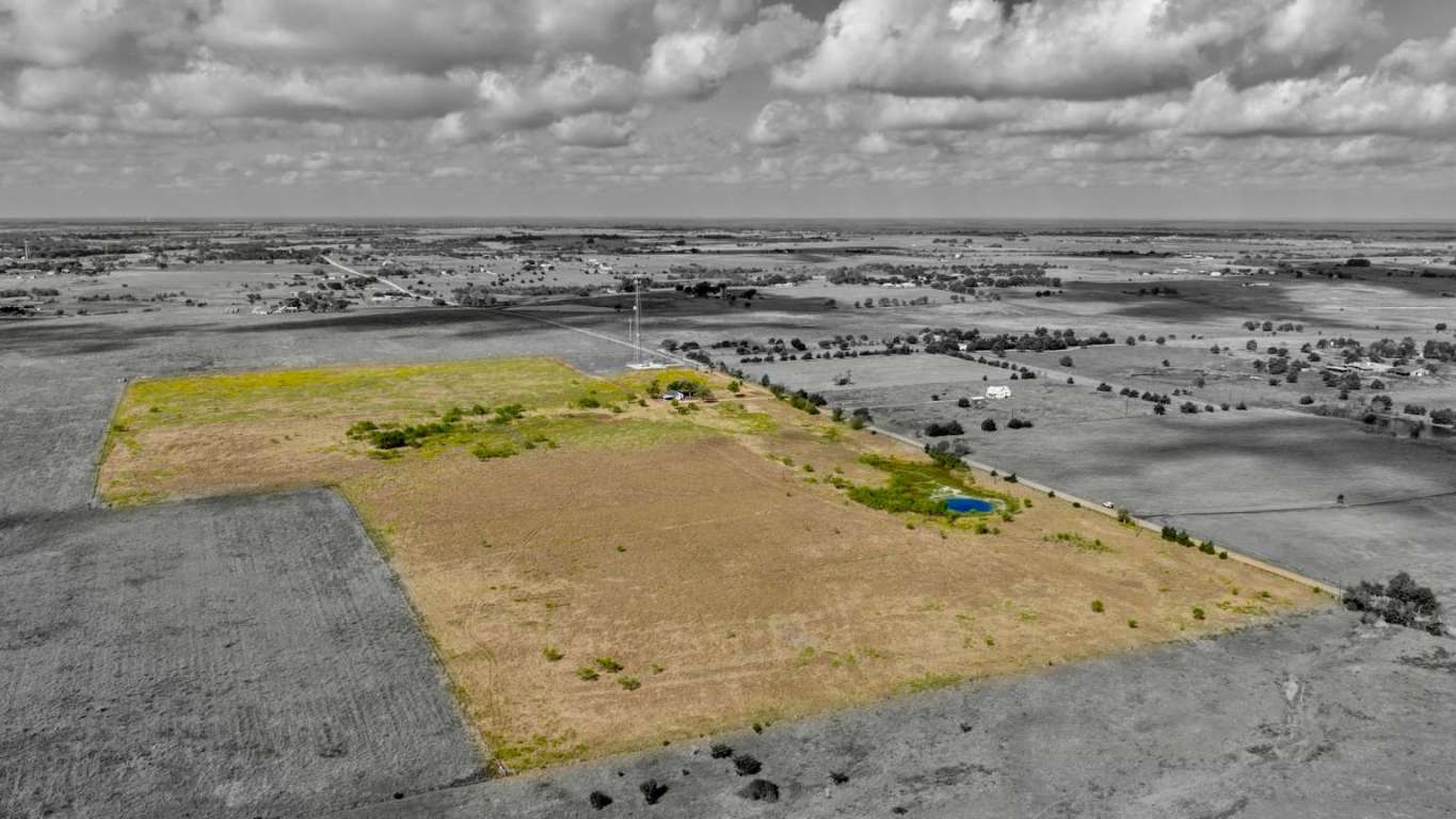 a view of swimming pool with a yard