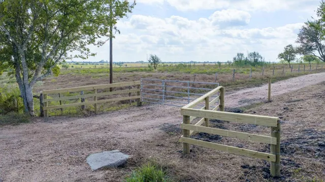 a view of a yard with sitting area