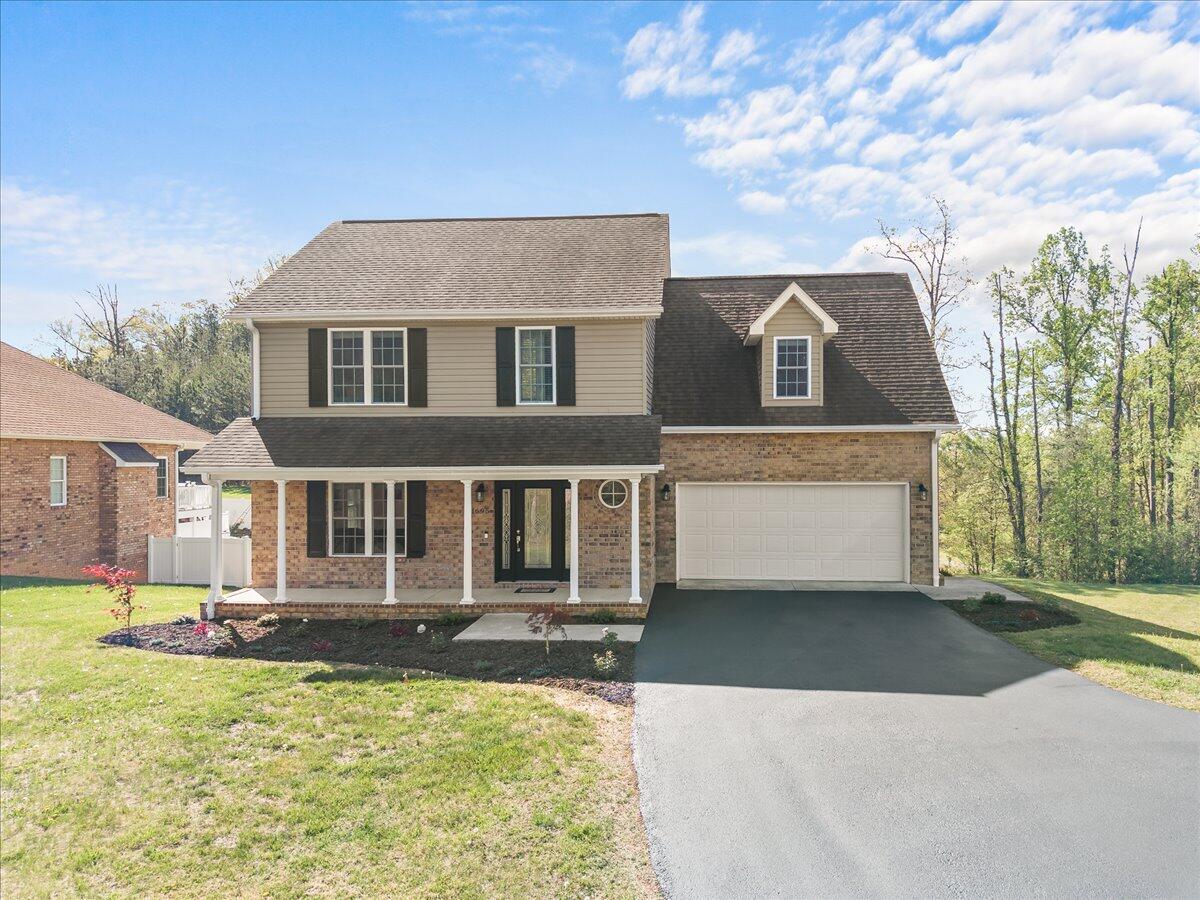 1695 Red Ln Extension Salem, VA 24153 - Photo 1 of 41 a front view of a house with a yard