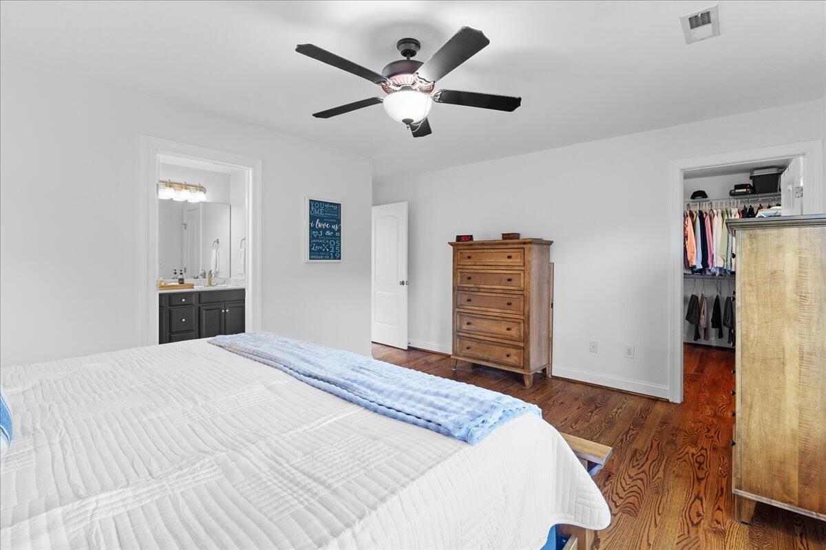 1695 Red Ln Extension Salem, VA 24153 - Photo 16 of 41 a bedroom with a bed and a chandelier