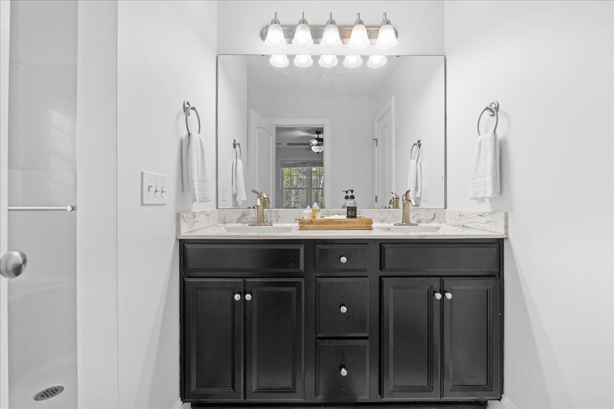 1695 Red Ln Extension Salem, VA 24153 - Photo 17 of 41 a bathroom with a sink vanity and a mirror